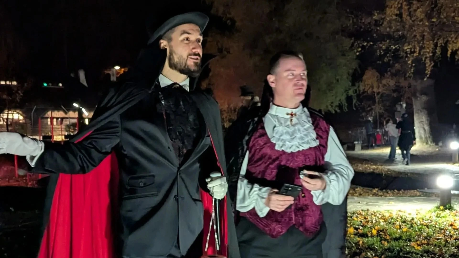 Costumed guests at Bran Castle after dark on a previous visit